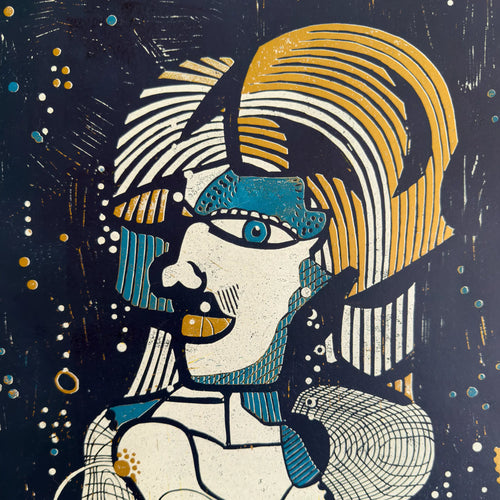 Detail from the linocut Underwater Love. It depicts a portrait of a male figure in gold, blue, and white.