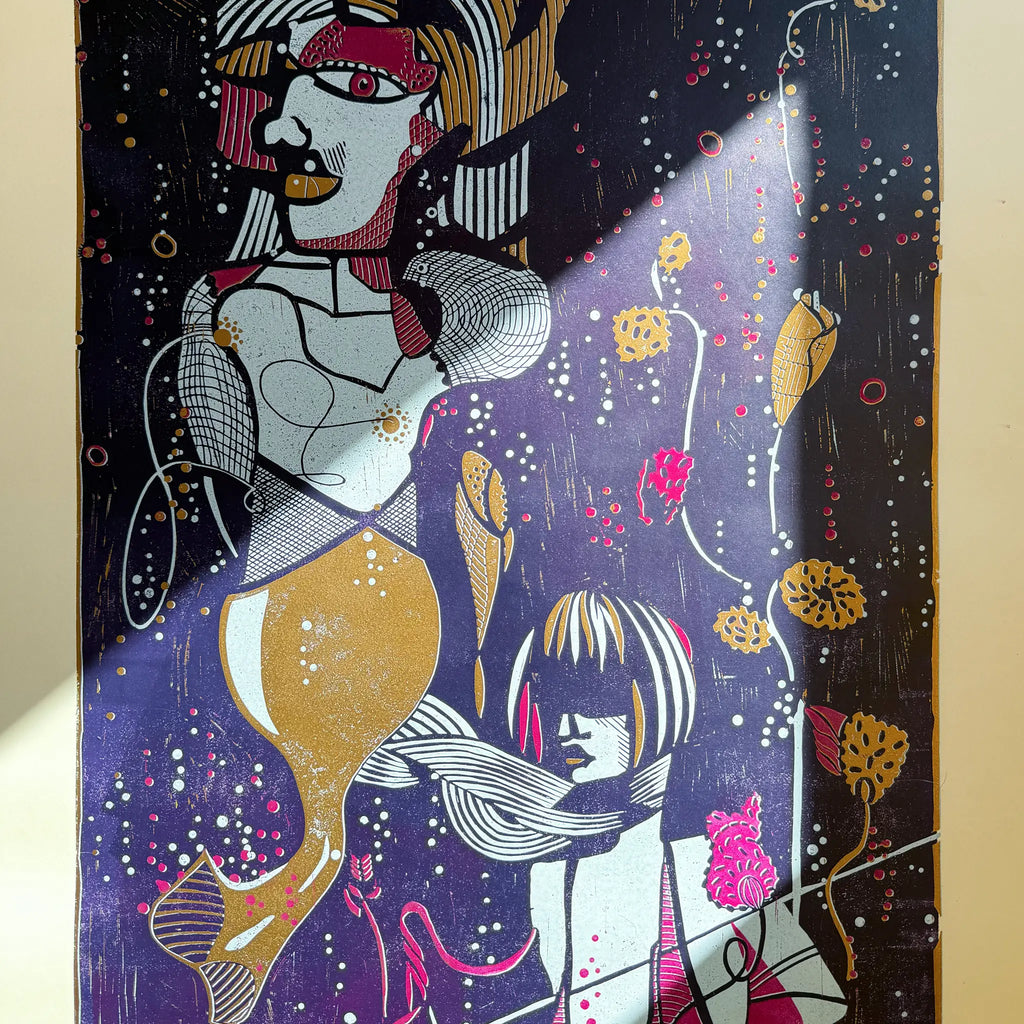 Detail from the linocut Underwater Love. It shows the reflection of sunlight on the artwork and how the colors begin to glow as a result.