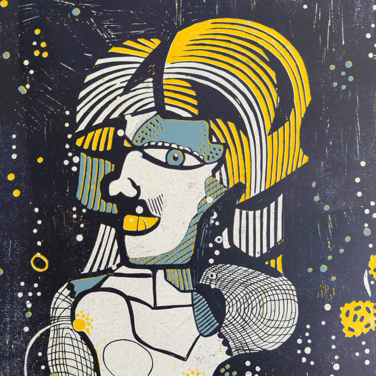 Detail from the linocut Underwater Love. It depicts a portrait of a male figure in yellow, blue and white.