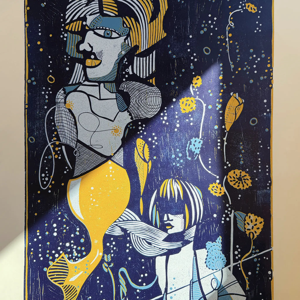 Detail from the linocut Underwater Love. It shows the reflection of sunlight on the artwork and how the colors begin to glow as a result.